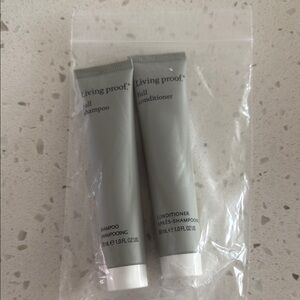 FREE WITH ANY PURCHASE LIVING Proof Shampoo and Conditioner Set SAMPLE SIZE